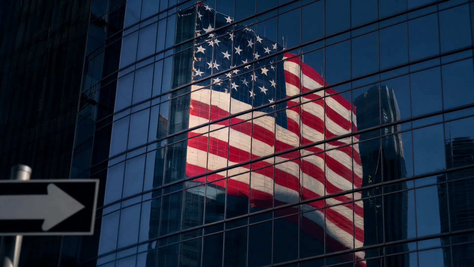 US skyline with one-way sign symbolising FATCA's one-way data exchange